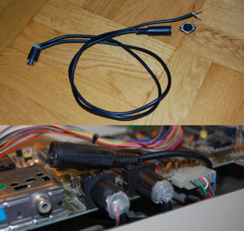 The serial Y-cable. Since the external connector should be mounted from the outside of the case, I need                     to pull the wires through the hole in the case before soldering it in place.